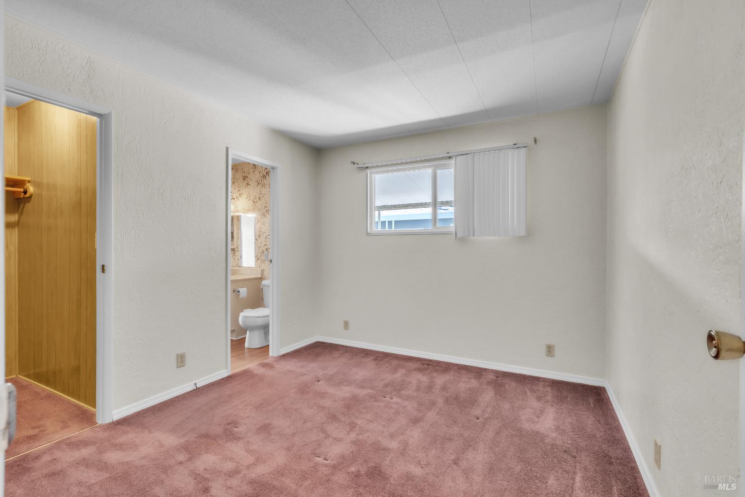 150 Silverado Trail, Unit 43 Napa, CA 94559 - Photo 19 of 29 an empty room with windows and closet