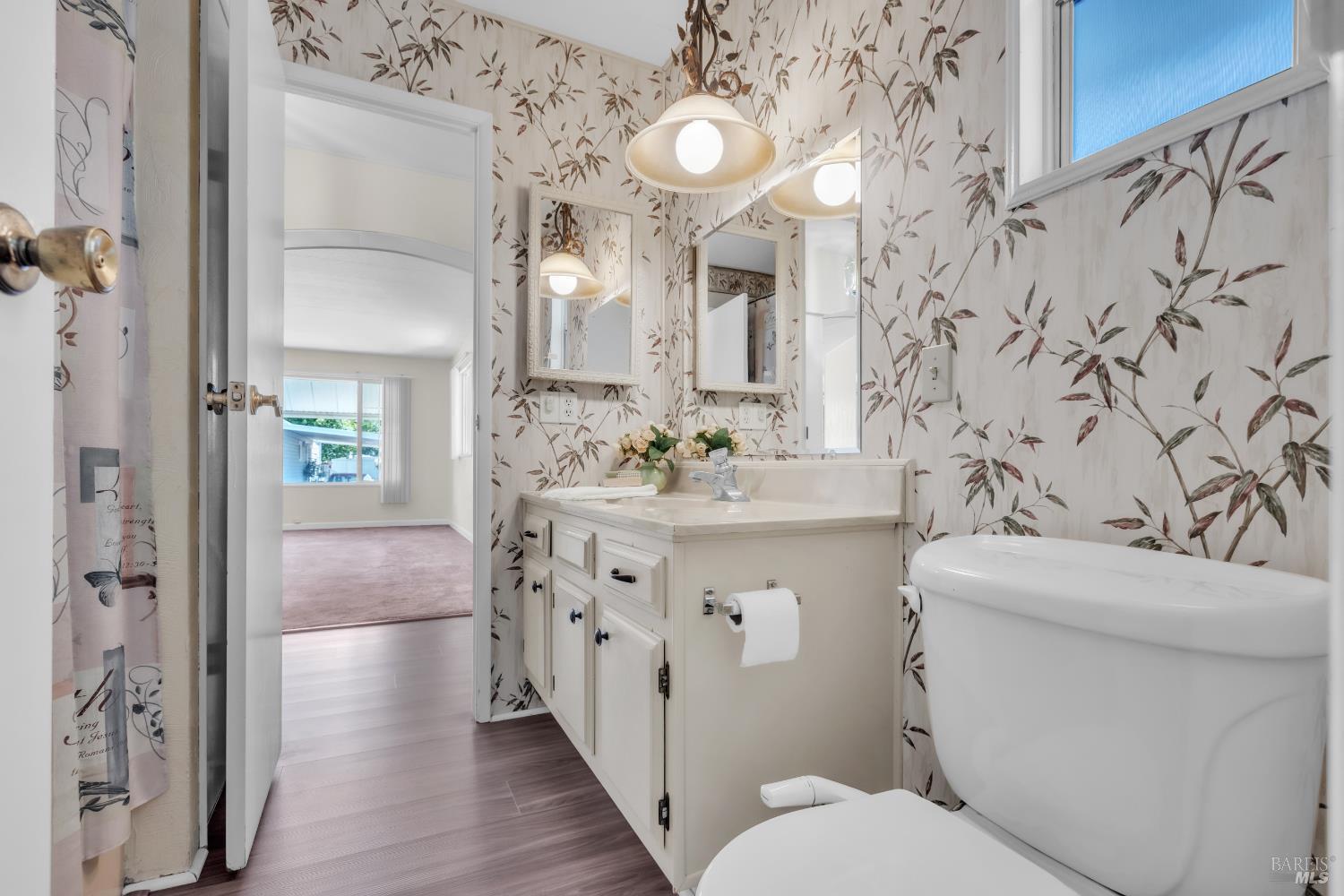 150 Silverado Trail, Unit 43 Napa, CA 94559 - Photo 22 of 29 a bathroom with a sink a toilet and shower