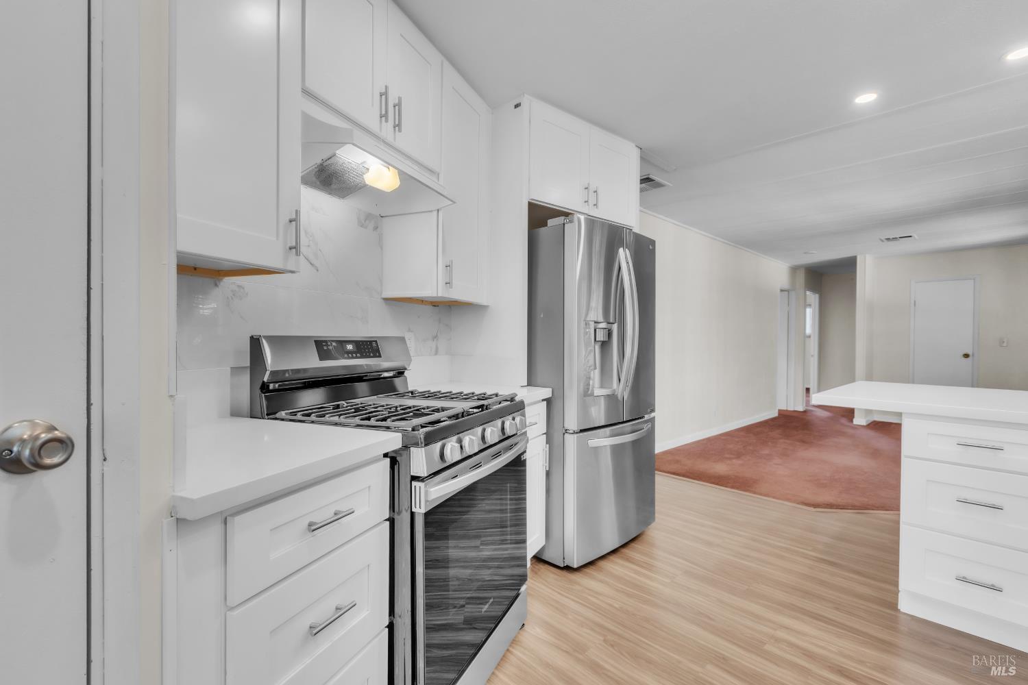 150 Silverado Trail, Unit 43 Napa, CA 94559 - Photo 6 of 29 a kitchen with stainless steel appliances granite countertop a stove a refrigerator and a refrigerator