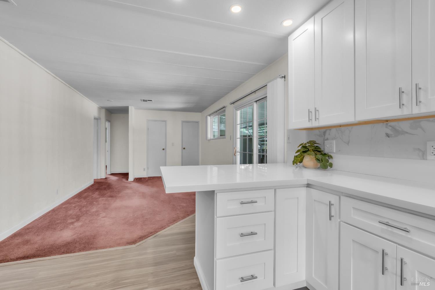 150 Silverado Trail, Unit 43 Napa, CA 94559 - Photo 7 of 29 a kitchen with white cabinets and sink