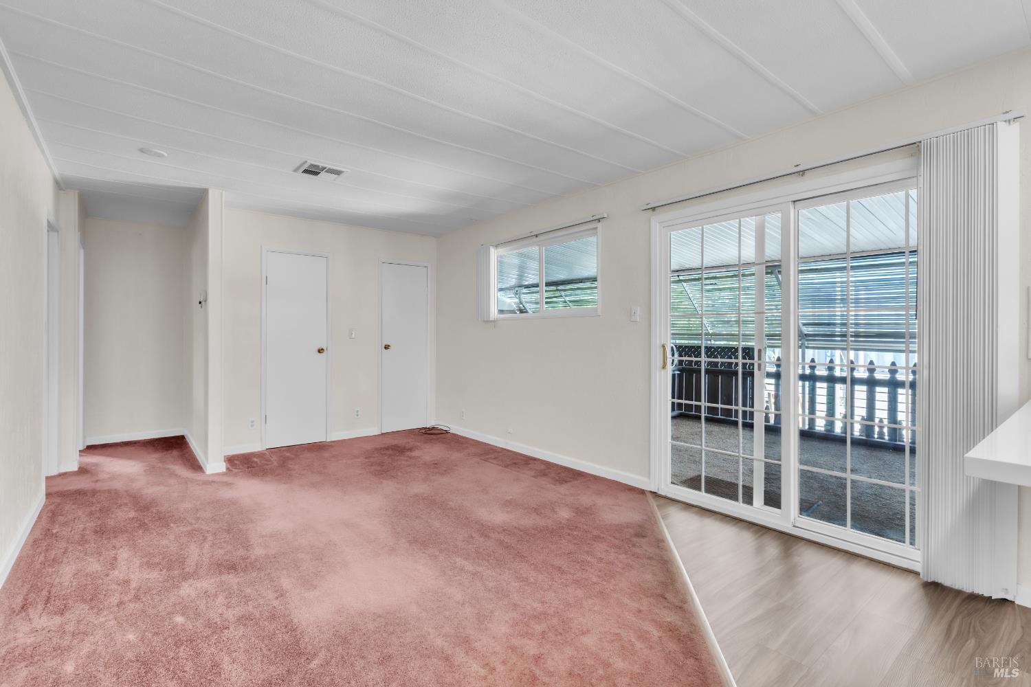 150 Silverado Trail, Unit 43 Napa, CA 94559 - Photo 8 of 29 wooden floor in an empty room with a window