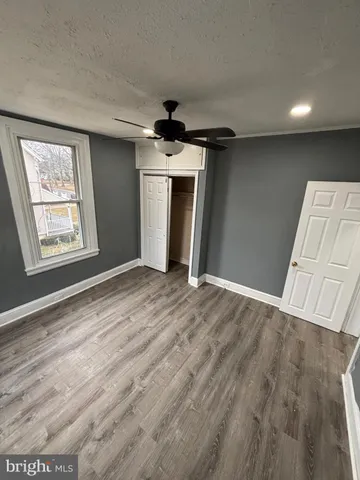 a view of a livingroom with wooden floor