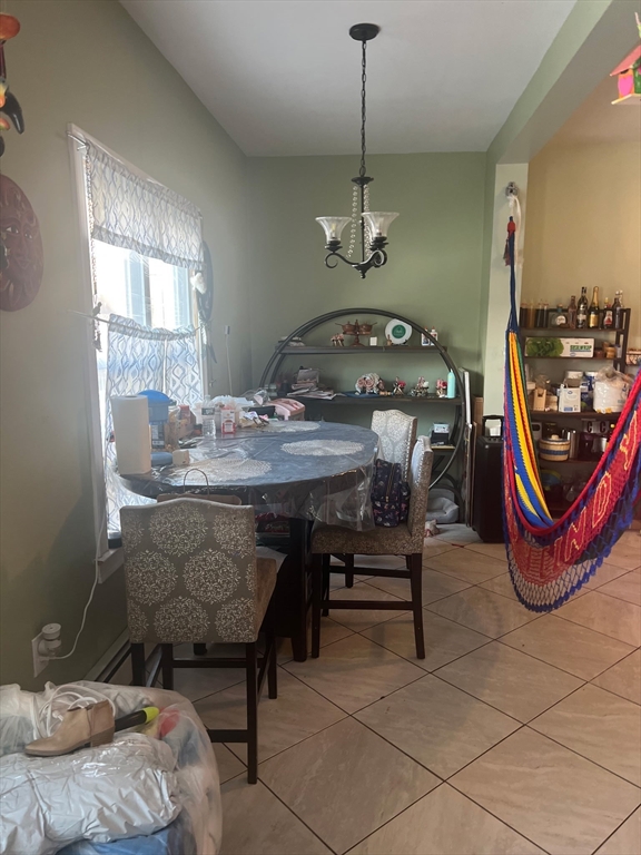 103 Warren Street Lynn, MA 01905 - Photo 14 of 24 a view of a dining room with furniture