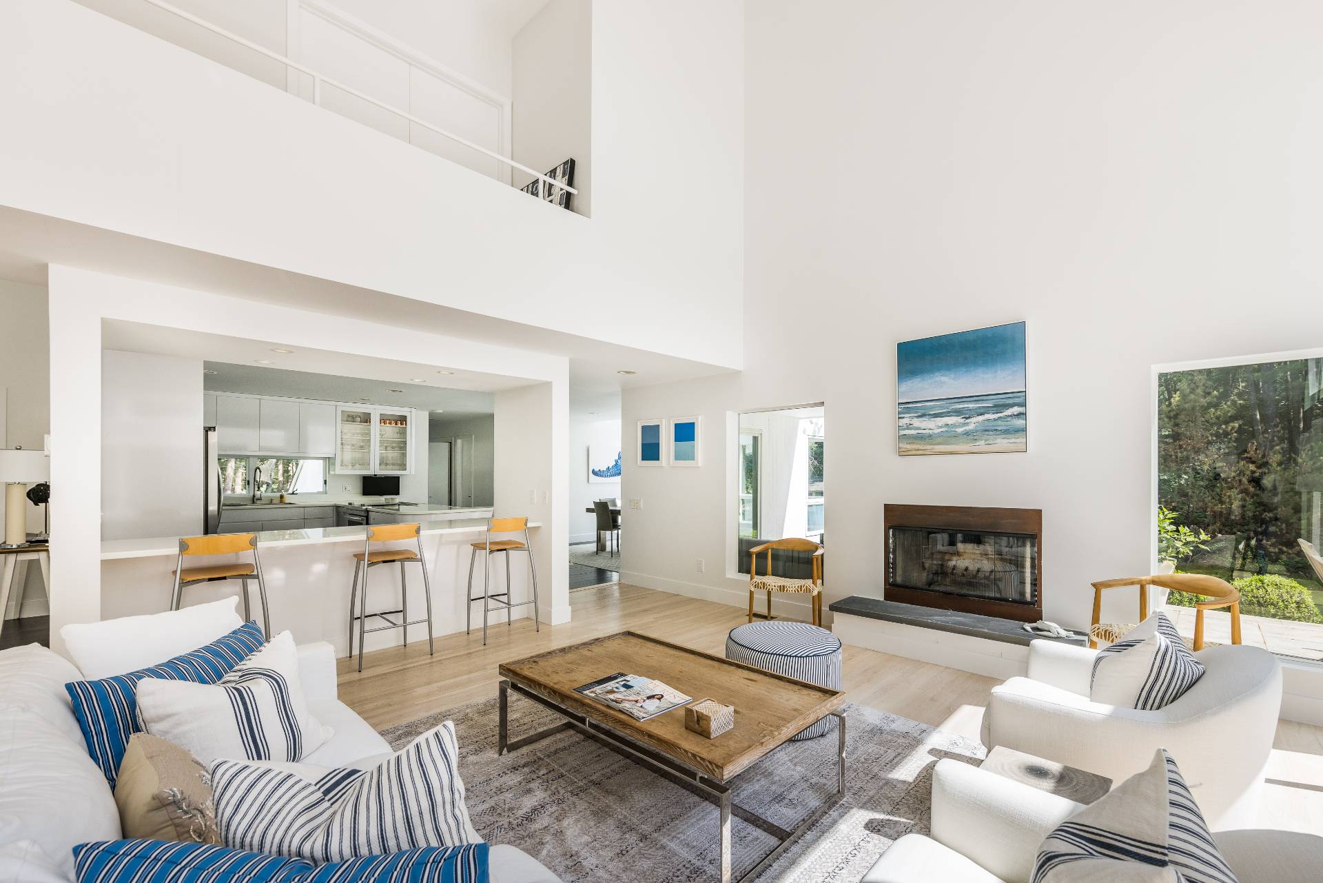 52 Bull Path East Hampton, NY 11937 - Photo 6 of 24 a living room with furniture and a fireplace