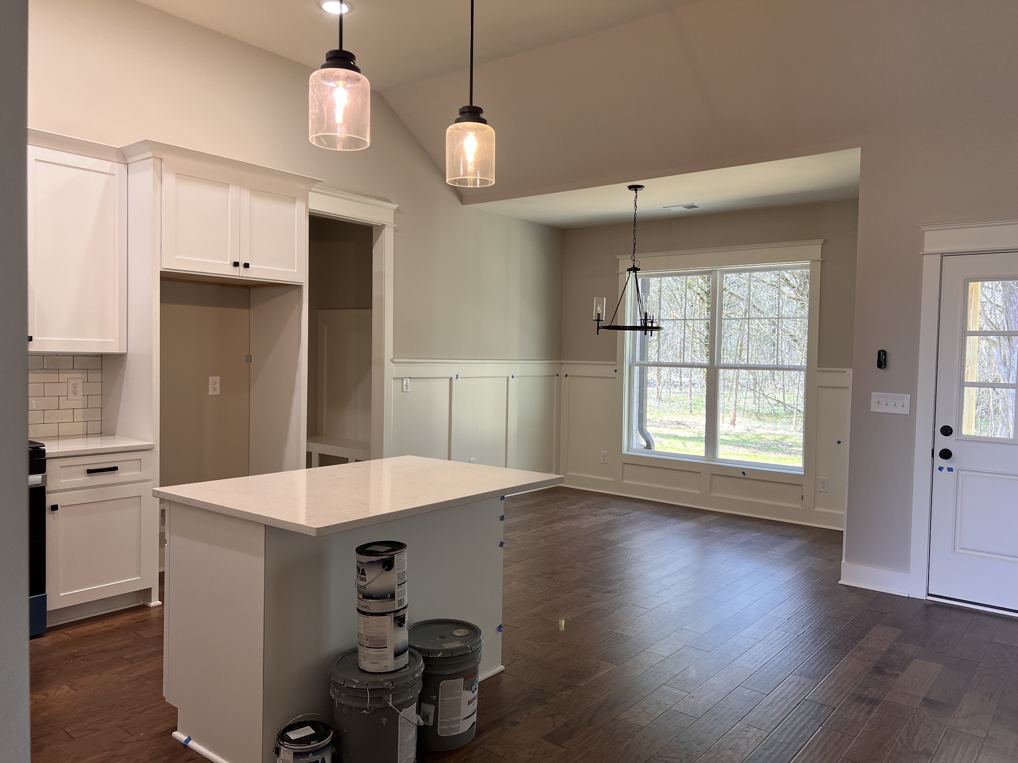 6730 Murfreesboro Road Lebanon, TN 37090 - Photo 3 of 12 a kitchen with a refrigerator a sink and dishwasher with wooden floor
