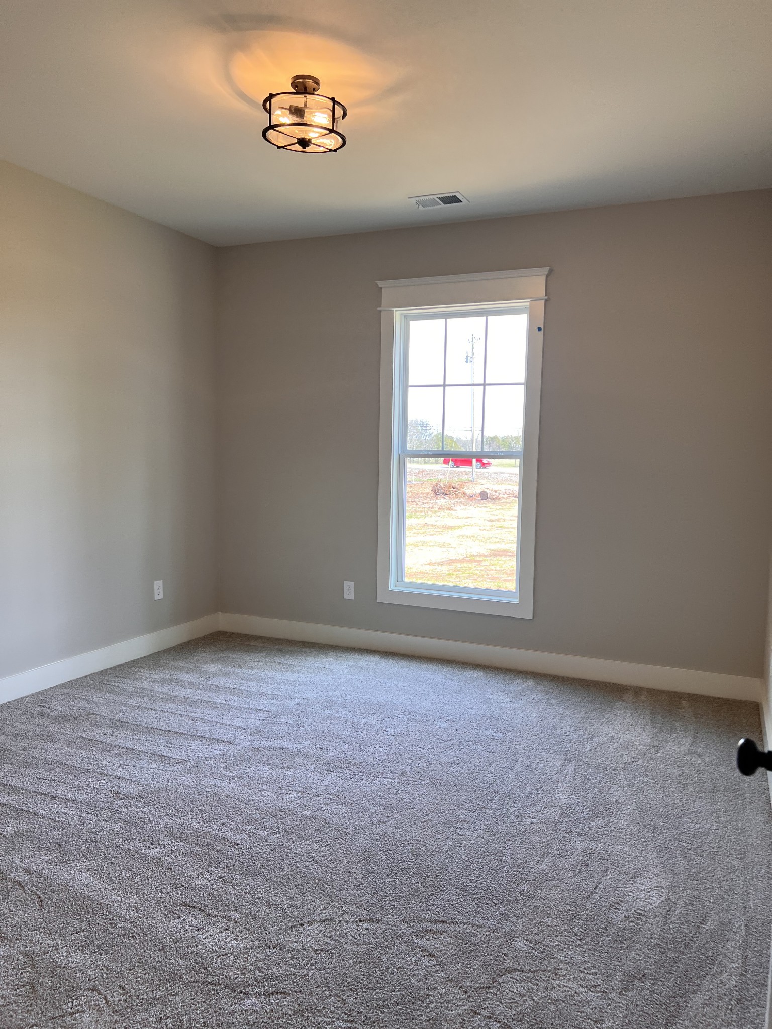 6730 Murfreesboro Road Lebanon, TN 37090 - Photo 9 of 12 an empty room with a window