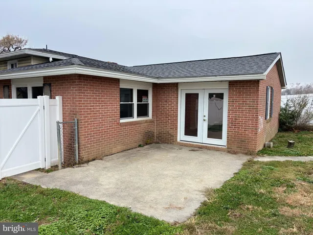a view of pool with trees