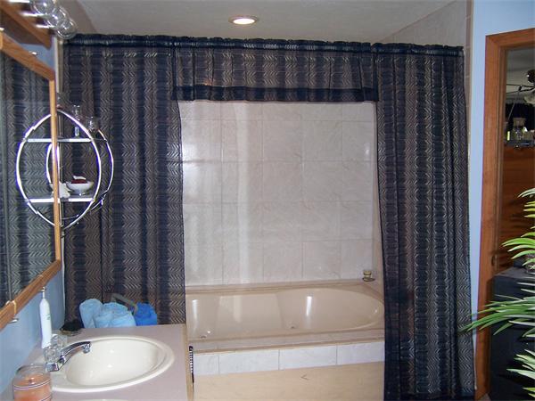 569 West Townsend Road Lunenburg, MA 01462 - Photo 15 of 18 a bathroom with a sink a toilet and shower