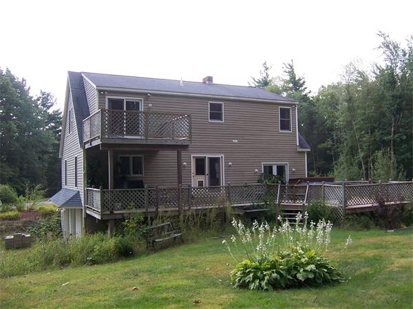 569 West Townsend Road Lunenburg, MA 01462 - Photo 2 of 18 a aerial view of a house with a yard
