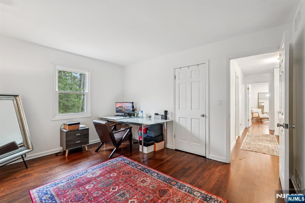 215 Readington Road Somerville, NJ 08876 - Photo 20 of 26 a view of a workspace with wooden floor and a window