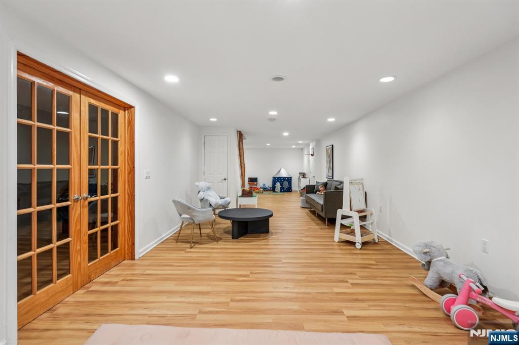 215 Readington Road Somerville, NJ 08876 - Photo 24 of 26 a living room with furniture a rug and white walls