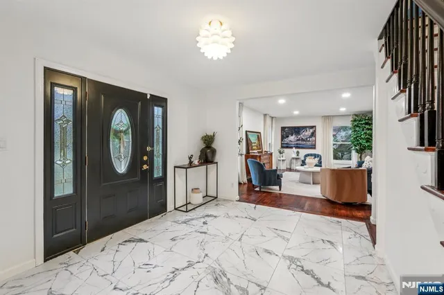 a bed room with a bed and a mirror