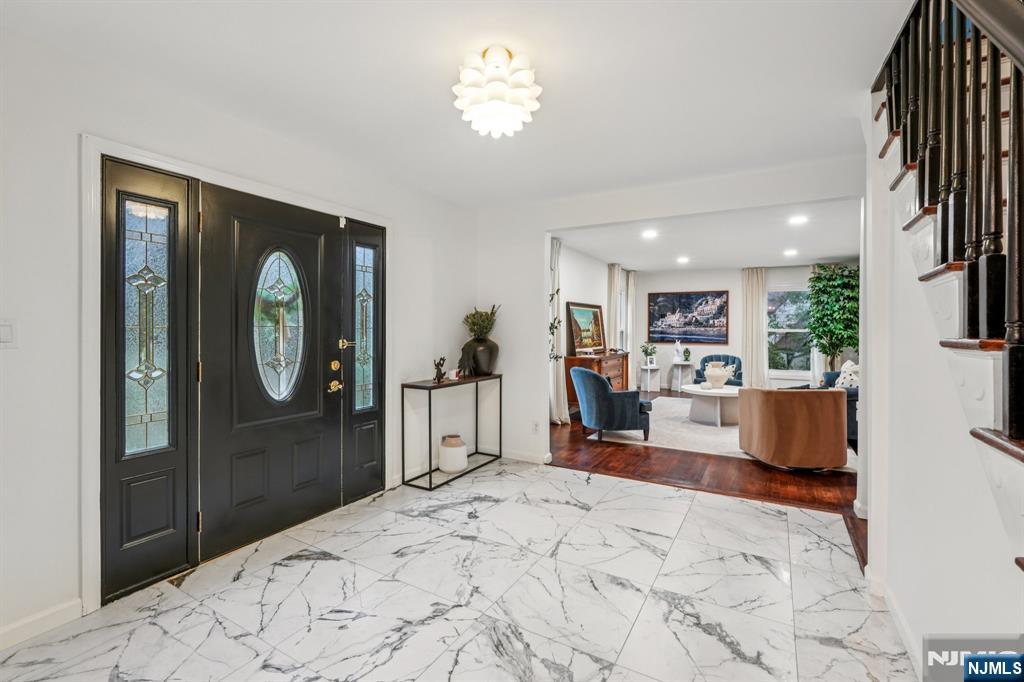 215 Readington Road Somerville, NJ 08876 - Photo 4 of 26 a bed room with a bed and a mirror