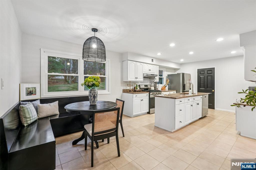 215 Readington Road Somerville, NJ 08876 - Photo 10 of 26 a view of a dining room with furniture window and outside view