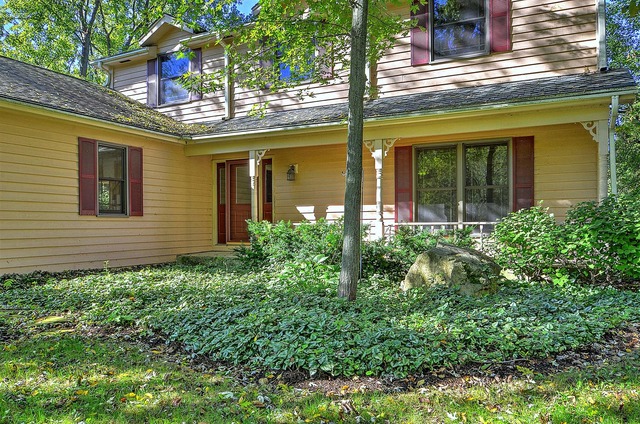 715 Roberts Lane Batavia, IL 60510 - Photo 2 of 24 front view of a house with a large window
