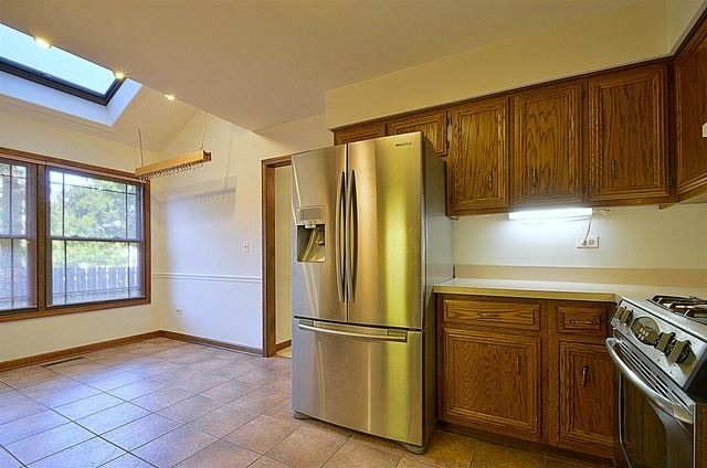 715 Roberts Lane Batavia, IL 60510 - Photo 8 of 24 a kitchen with stainless steel appliances granite countertop a refrigerator and a stove