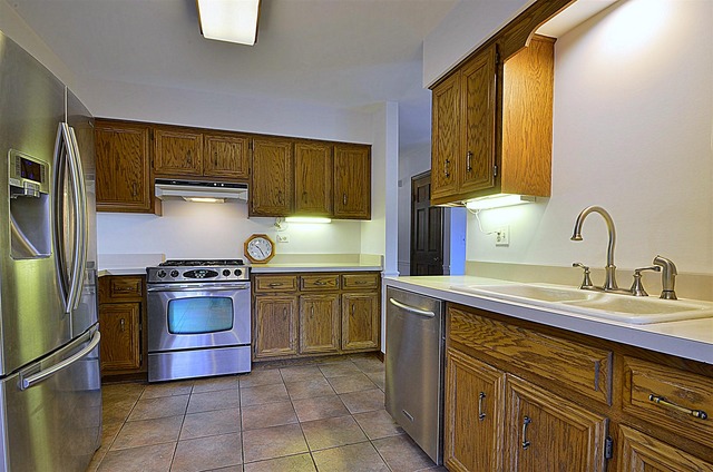 715 Roberts Lane Batavia, IL 60510 - Photo 9 of 24 a kitchen with stainless steel appliances granite countertop a sink stove and refrigerator