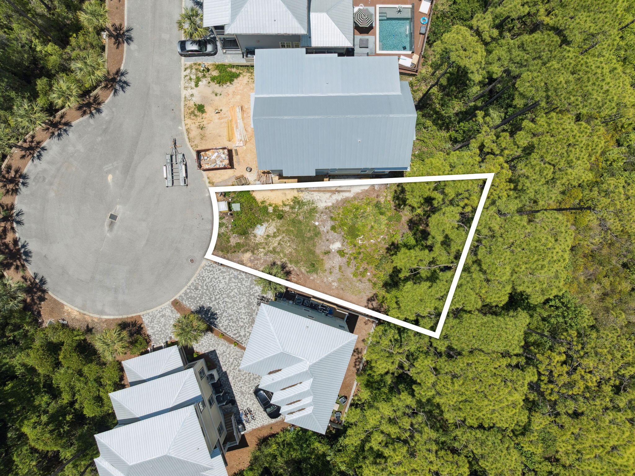 Lot 68 North Silver Maple Dr Inlet Beach Inlet Beach, FL 32461 - Photo 10 of 14 an aerial view of a house with a yard and a fountain