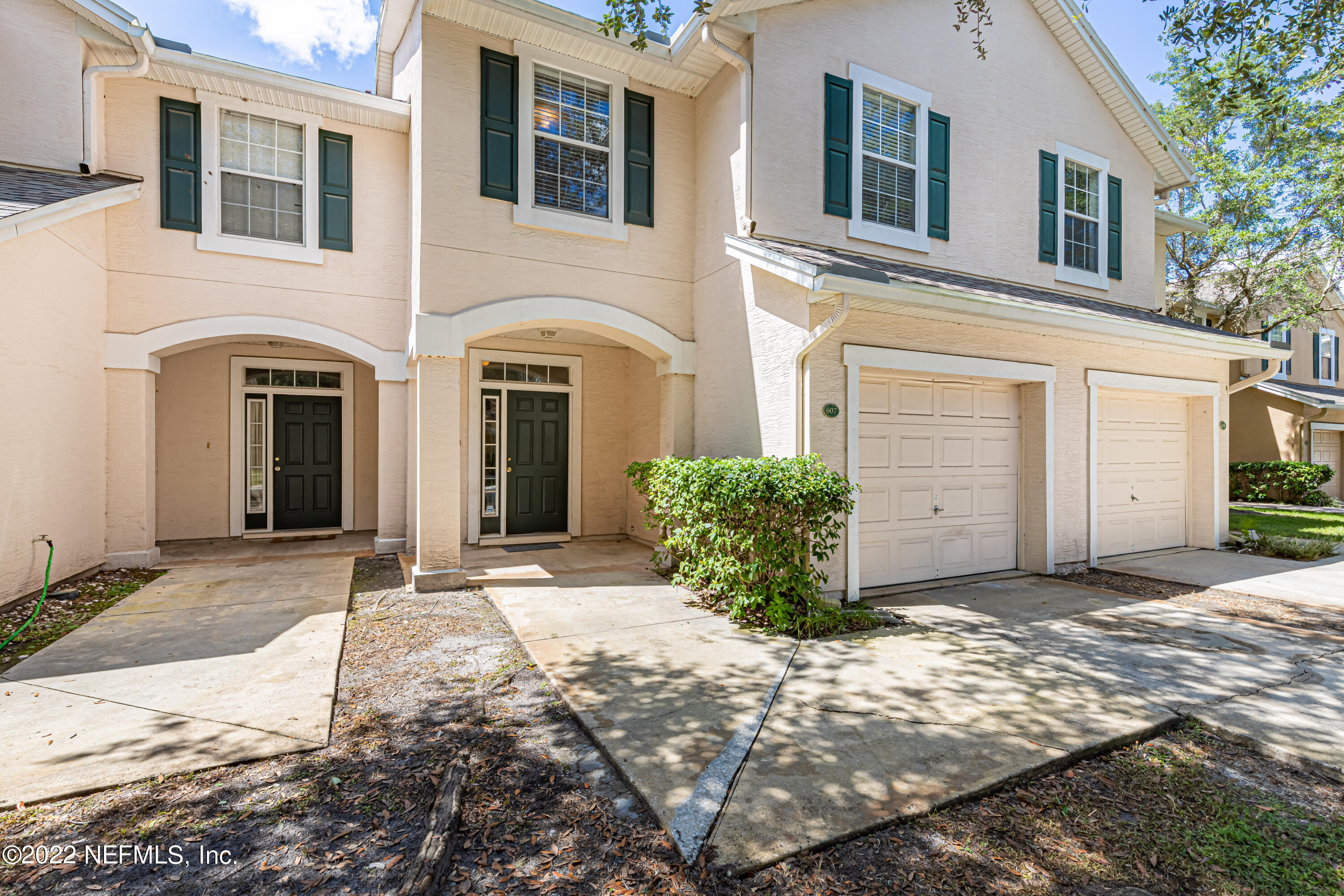 5260 Collins Road, Unit 607 Jacksonville, FL 32244 - Photo 2 of 41 a view of a house with a yard