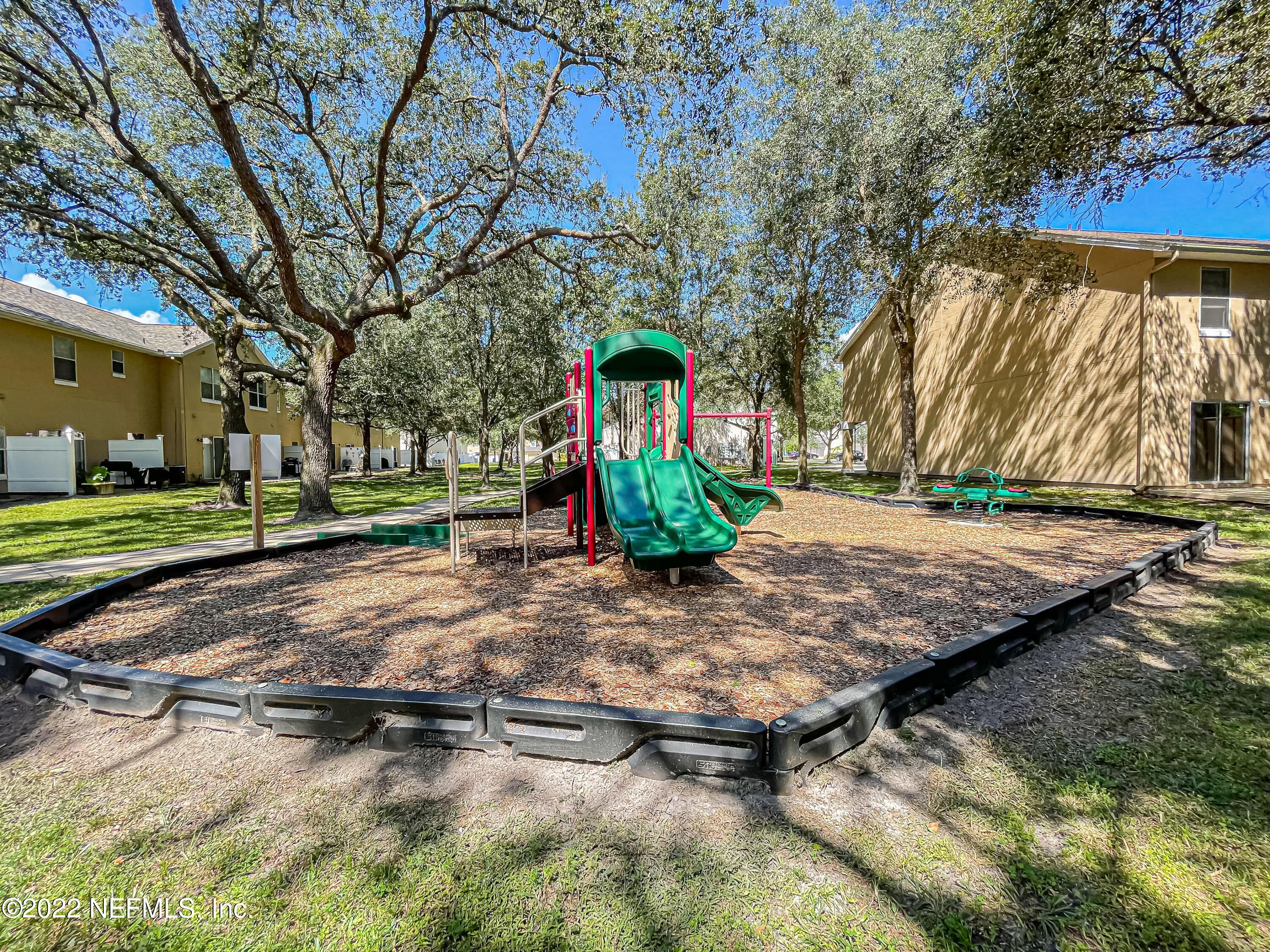 5260 Collins Road, Unit 607 Jacksonville, FL 32244 - Photo 40 of 41 a view of a park with basketball court