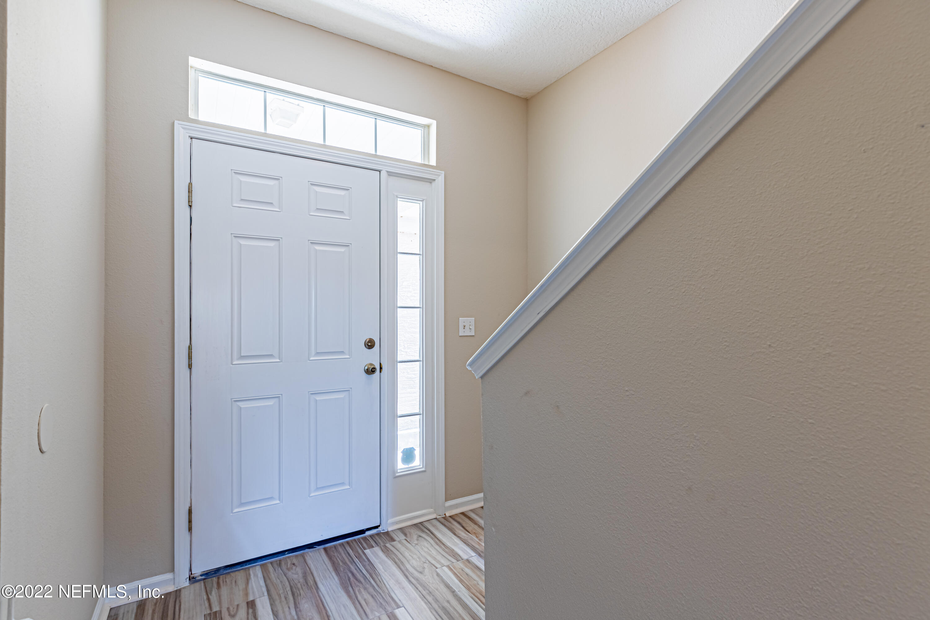 5260 Collins Road, Unit 607 Jacksonville, FL 32244 - Photo 4 of 41 a view of front door with hallway
