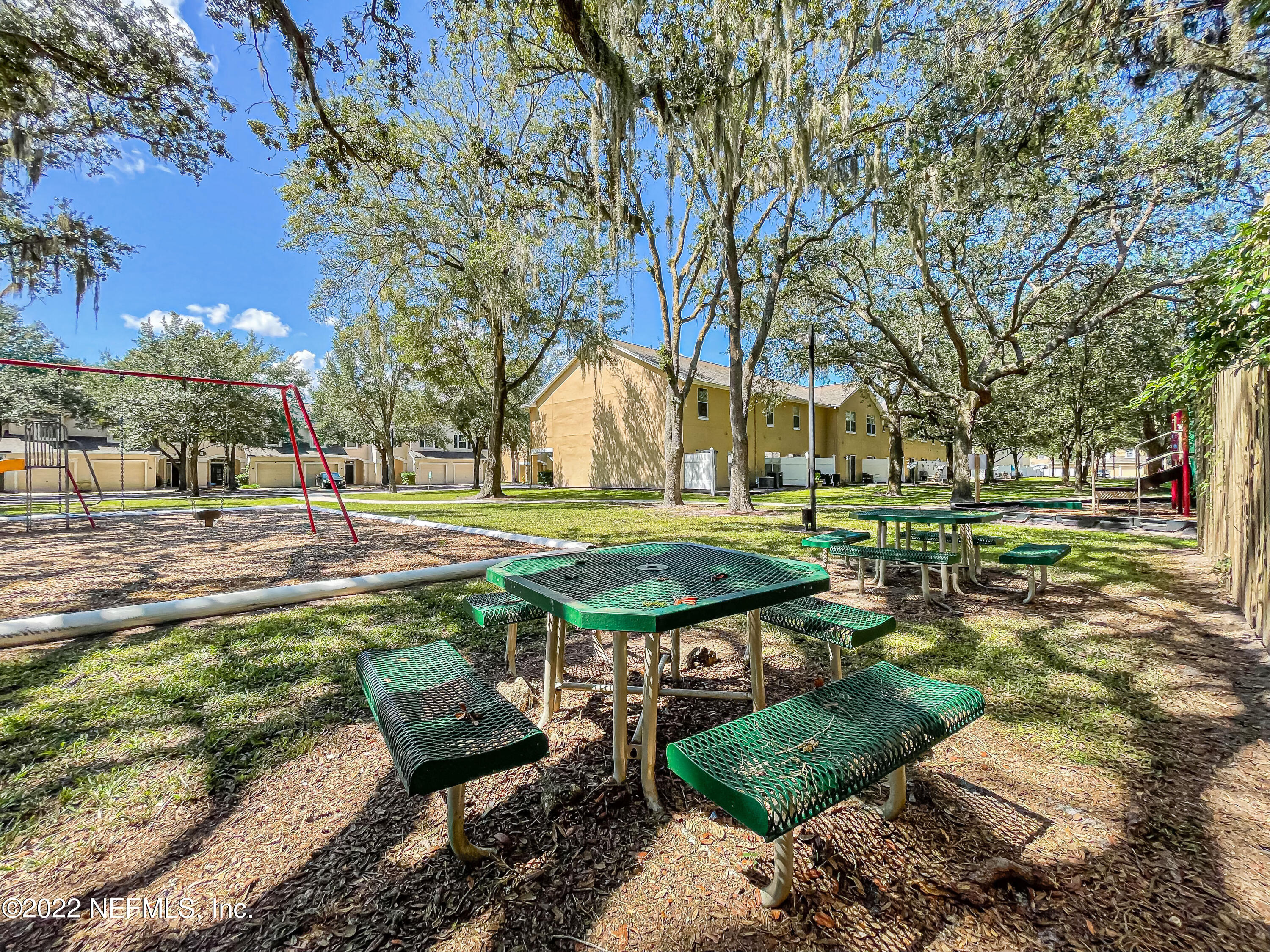 5260 Collins Road, Unit 607 Jacksonville, FL 32244 - Photo 41 of 41 a view of a park with bench and trees