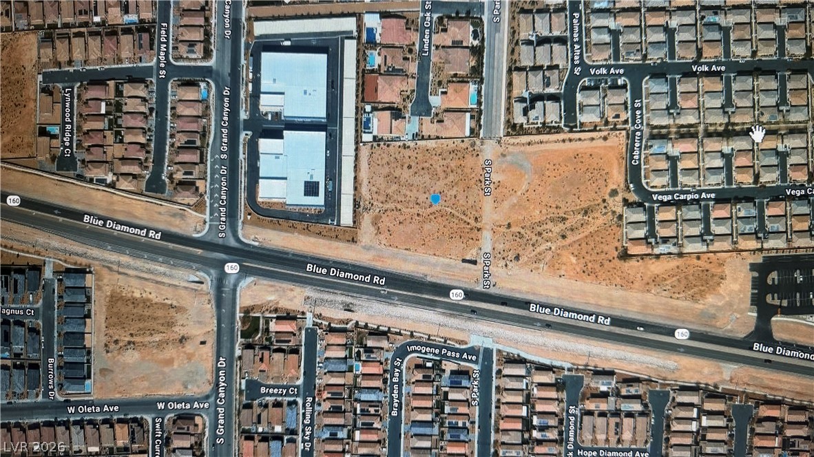 0 Blue Diamond Road Las Vegas, NV 89178 - Photo 5 of 25 An aerial perspective showcases the neighborhood's layout, providing a clear overview of the area.