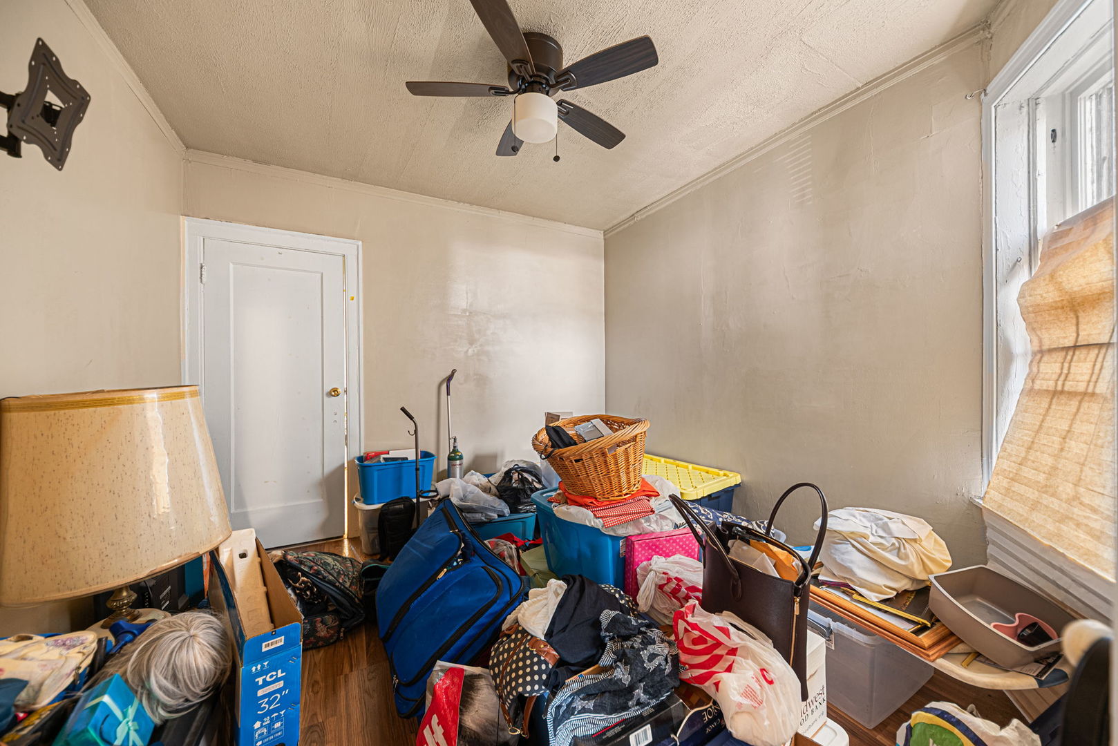 6749 South Peoria Street Chicago, IL 60621 - Photo 10 of 20 a bedroom with furniture and a window