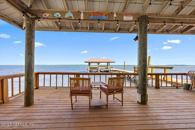 a view of chairs on the deck