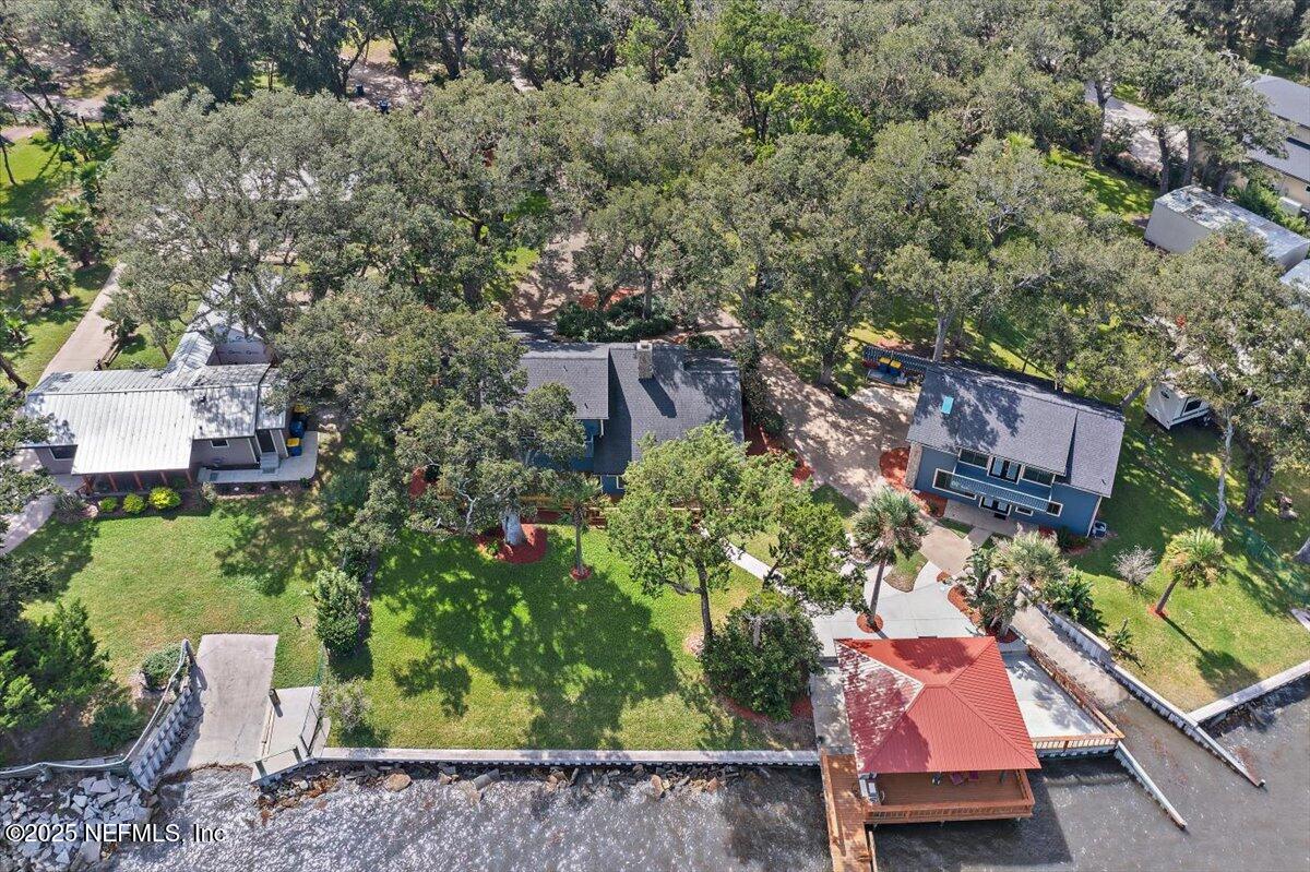 16361 Waterville Road, Unit 1 Jacksonville, FL 32226 - Photo 10 of 32 an aerial view of a house with a yard basket ball court and outdoor seating