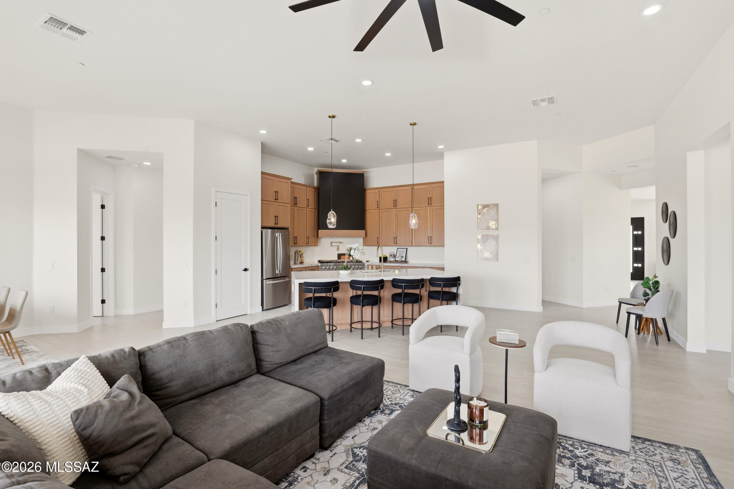 14527 East Sands Ranch Road Vail, AZ 85641 - Photo 12 of 48 a living room with furniture and kitchen view
