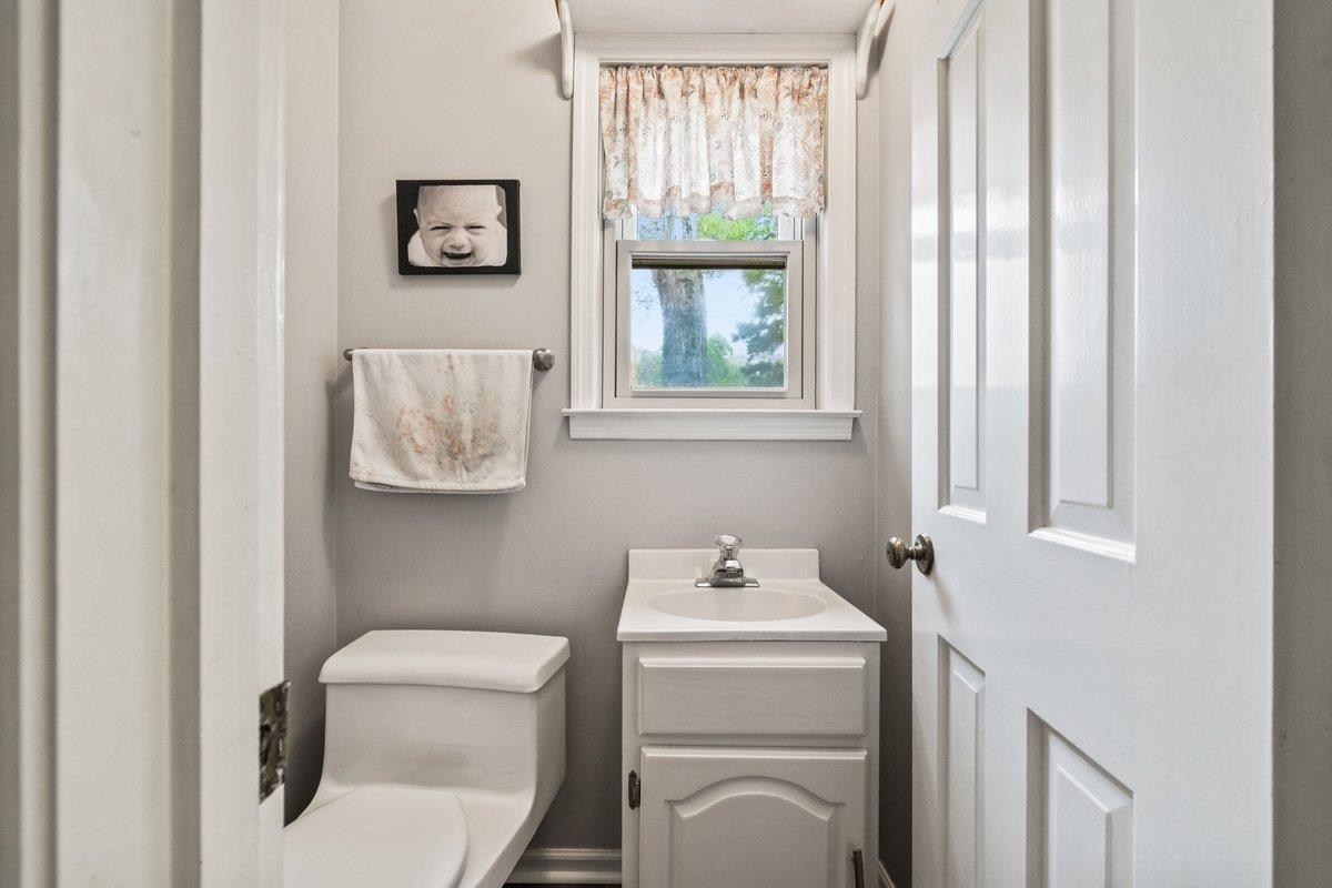 2135 Brierbrook Road Germantown, TN 38138 - Photo 24 of 25 Half bathroom with toilet and vanity