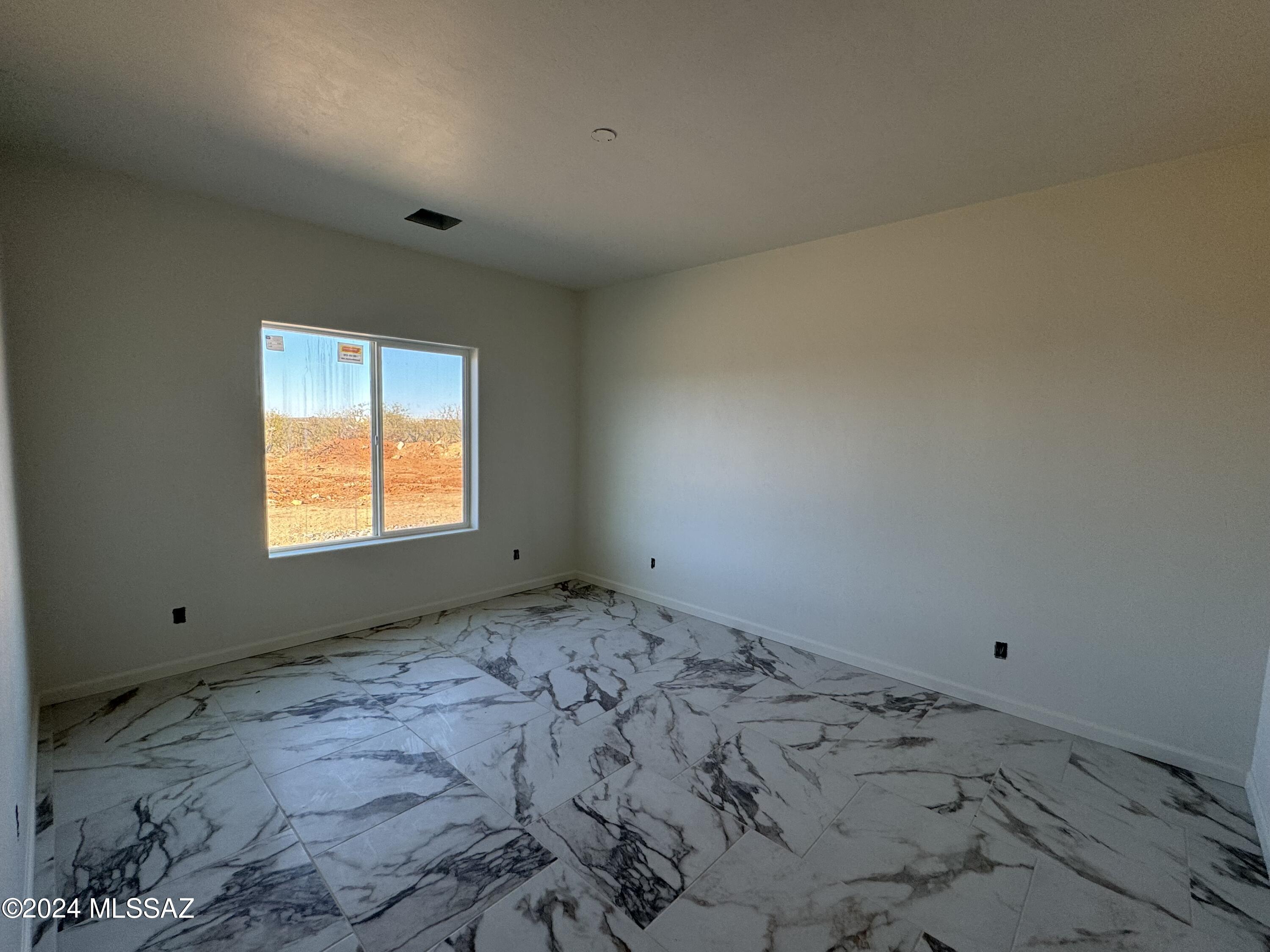 1643 Bala Court Rio Rico, AZ 85648 - Photo 7 of 18 a view of a room with window