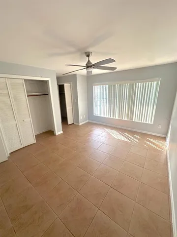a view of a livingroom with a staircase