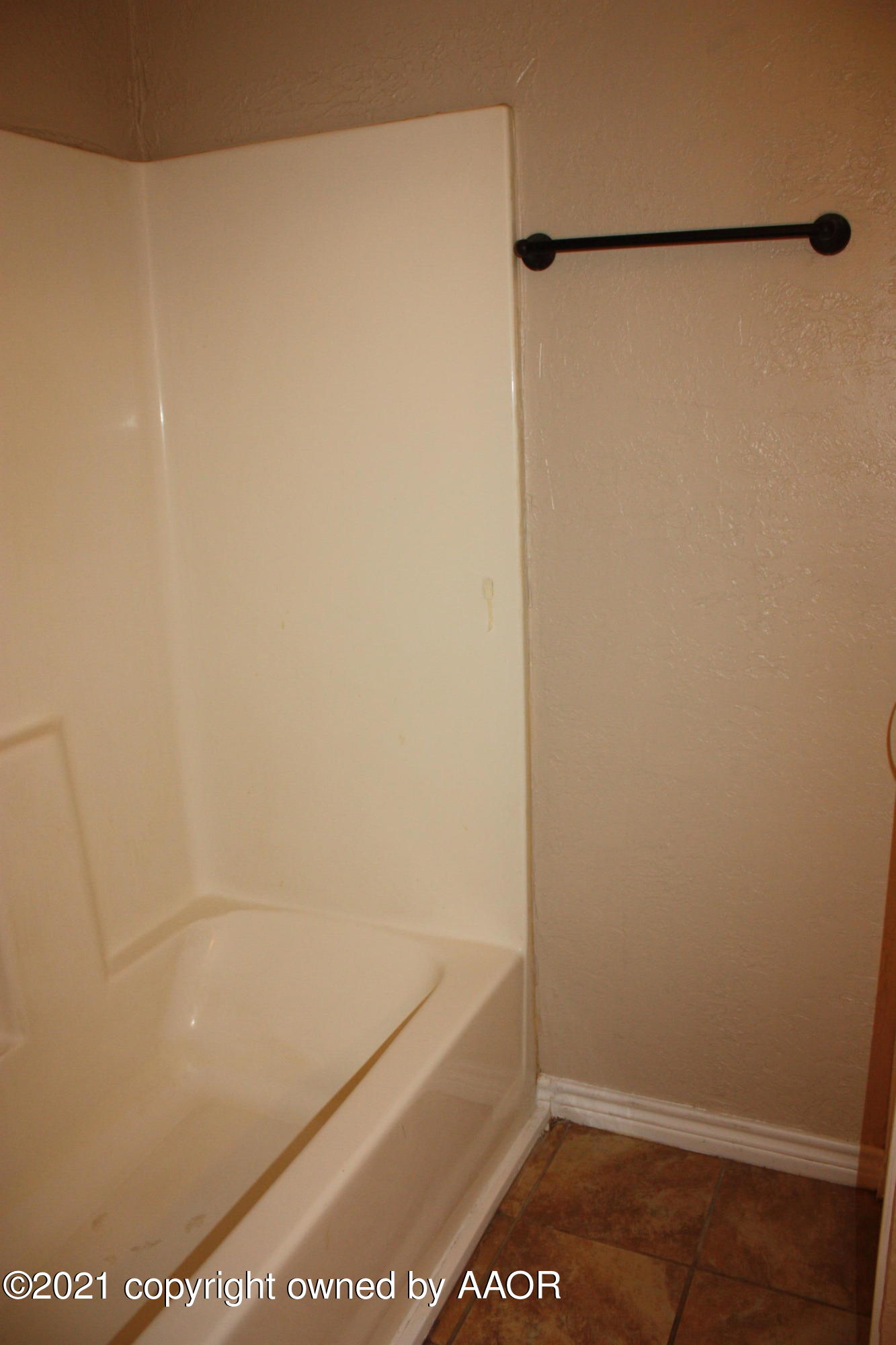 3905 South Tyler Street Amarillo, TX 79110 - Photo 13 of 35 a bathroom with a shower