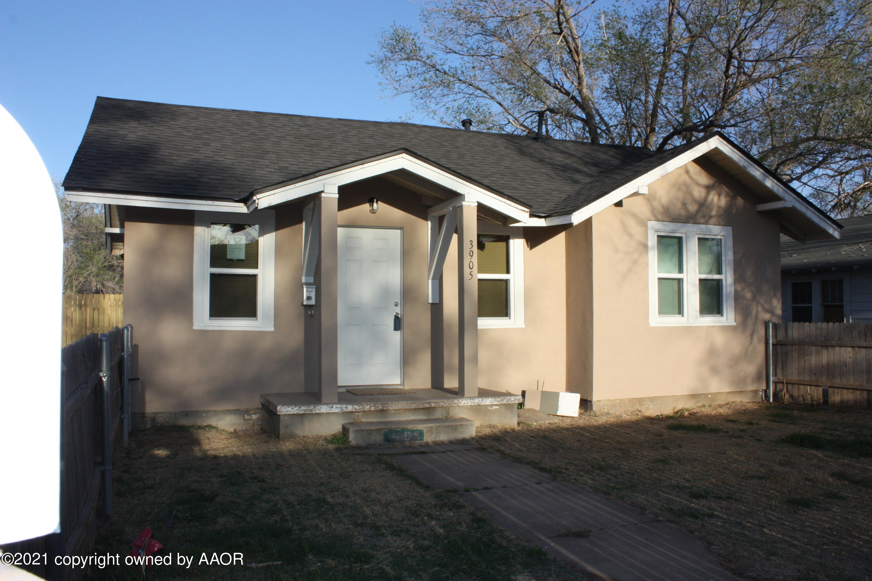 3905 South Tyler Street Amarillo, TX 79110 - Photo 3 of 35 a front view of house with yard