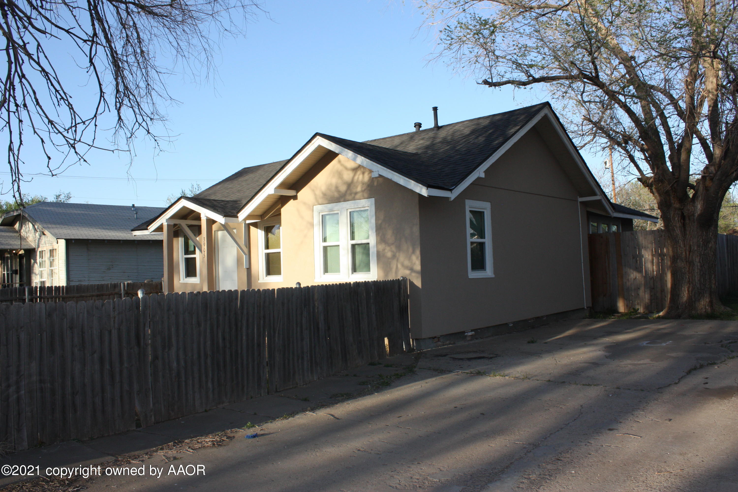 3905 South Tyler Street Amarillo, TX 79110 - Photo 4 of 35 a front view of a house with a garage