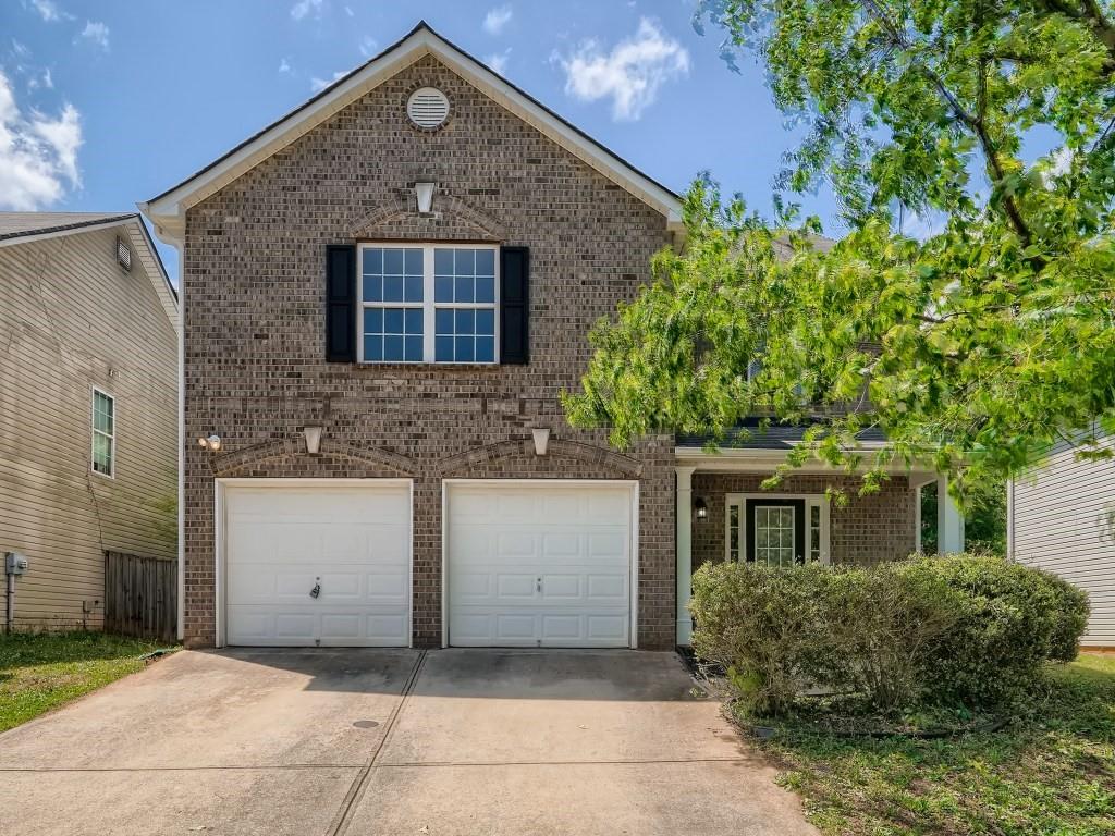 4018 Riverside Parkway Decatur, GA 30034 - Photo 1 of 1 a front view of a house with a brick wall