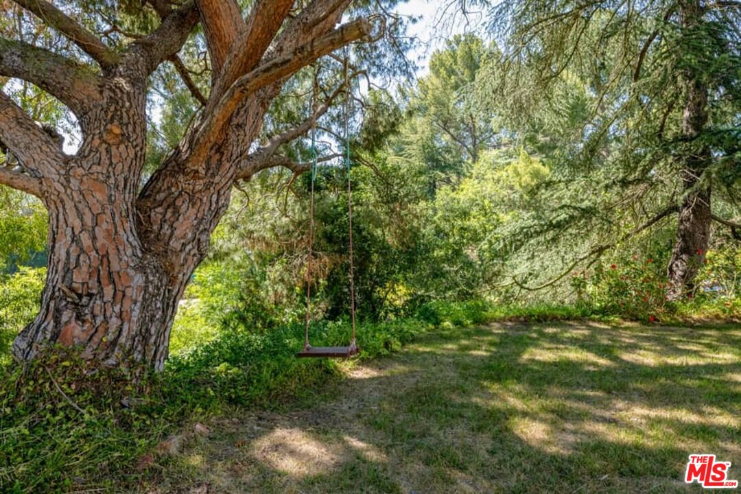 2841 Roscomare Road Los Angeles, CA 90077 - Photo 22 of 28 a view of yard with green space