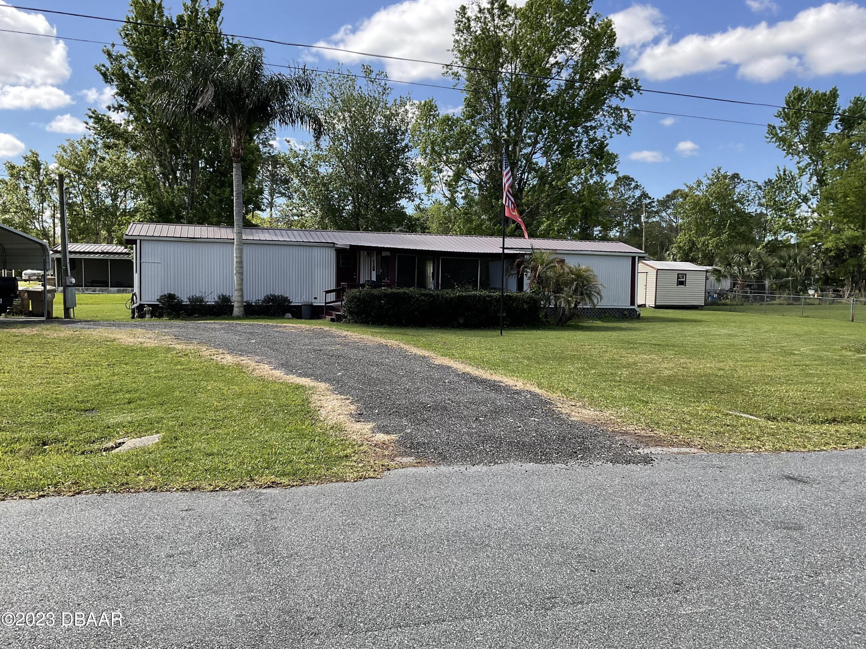23944 Coon Road Astor, FL 32102 - Photo 1 of 20 Front view
