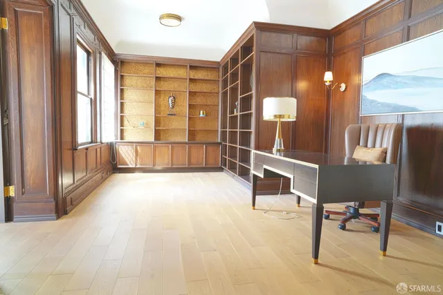 a living room with furniture and window
