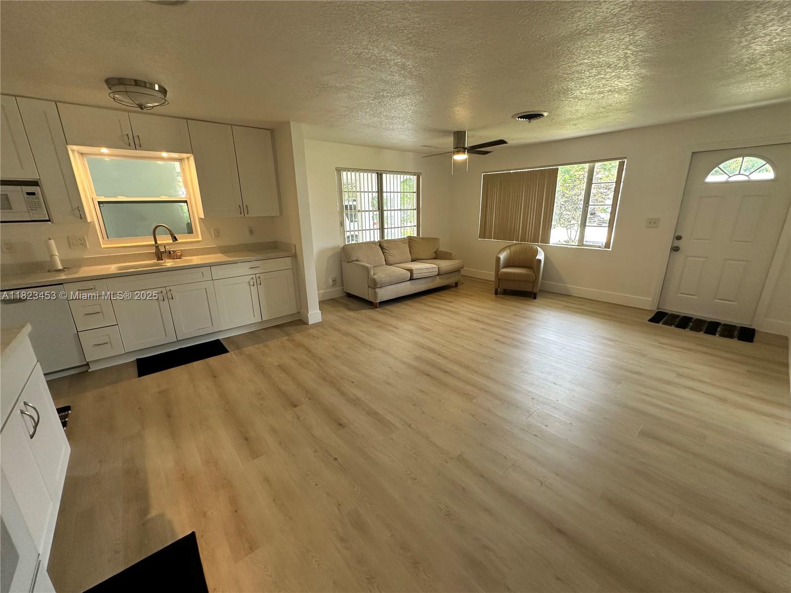 201 East 28th Street Riviera Beach, FL 33404 - Photo 12 of 27 a large room with a window