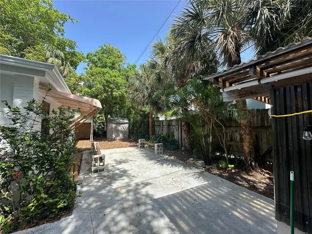 a view of house with patio