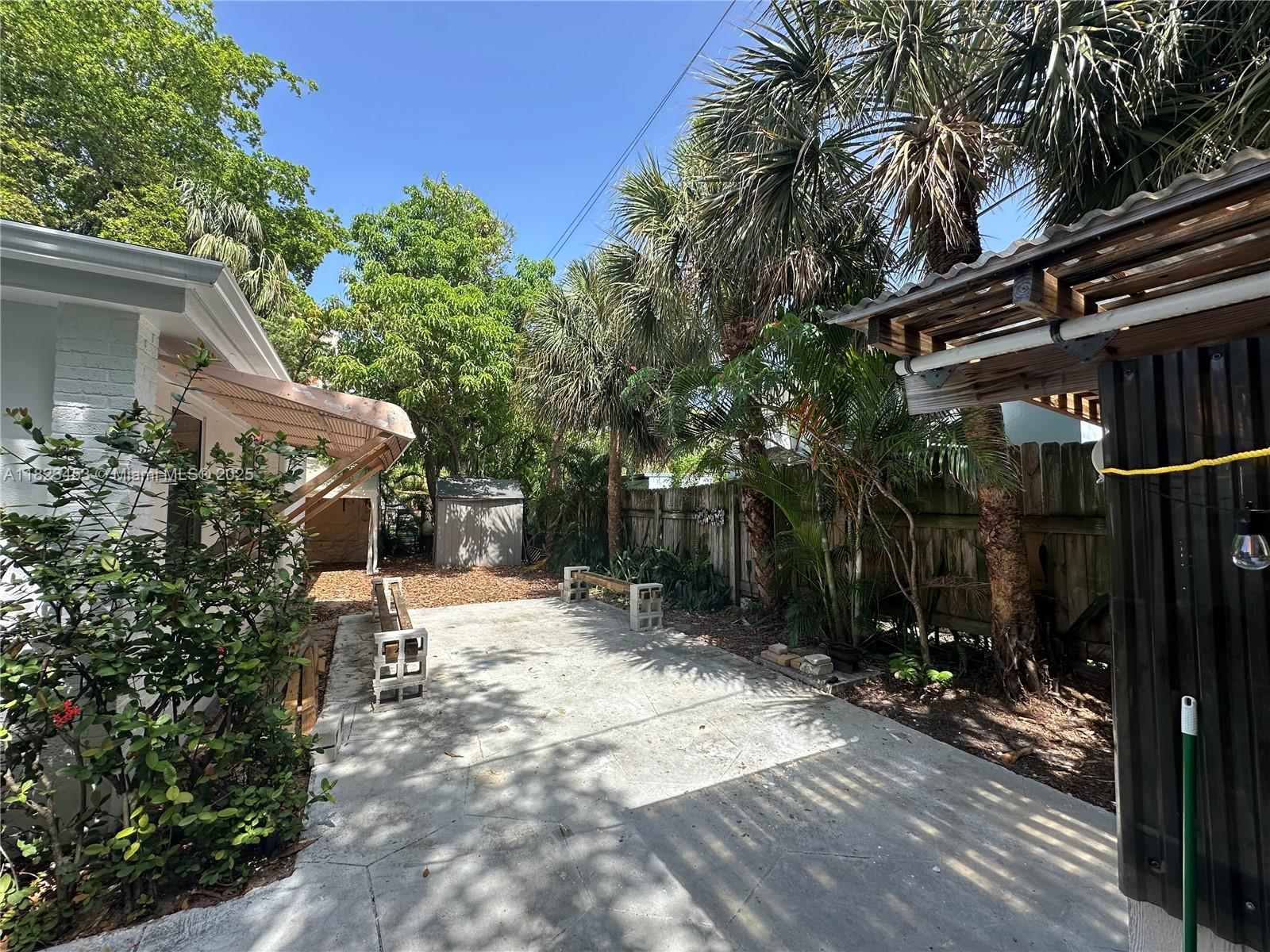 201 East 28th Street Riviera Beach, FL 33404 - Photo 21 of 27 a view of house with patio
