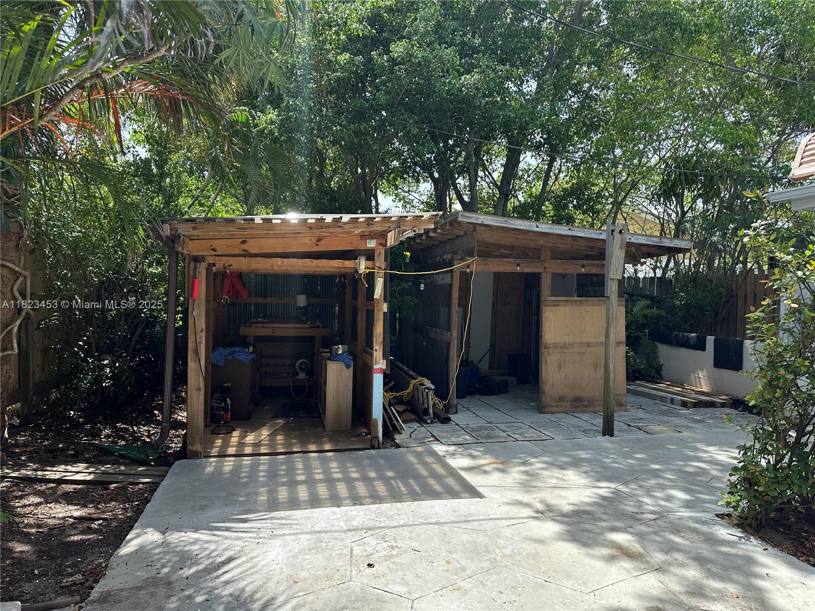 201 East 28th Street Riviera Beach, FL 33404 - Photo 24 of 27 a view of a house with backyard