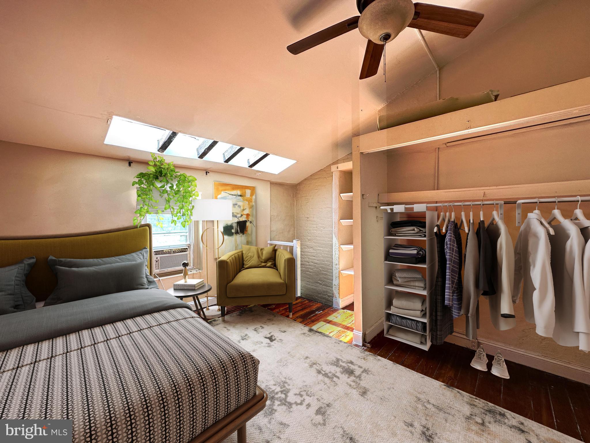 623 South American Street, Unit F Philadelphia, PA 19147 - Photo 2 of 38 a bedroom with furniture and a window