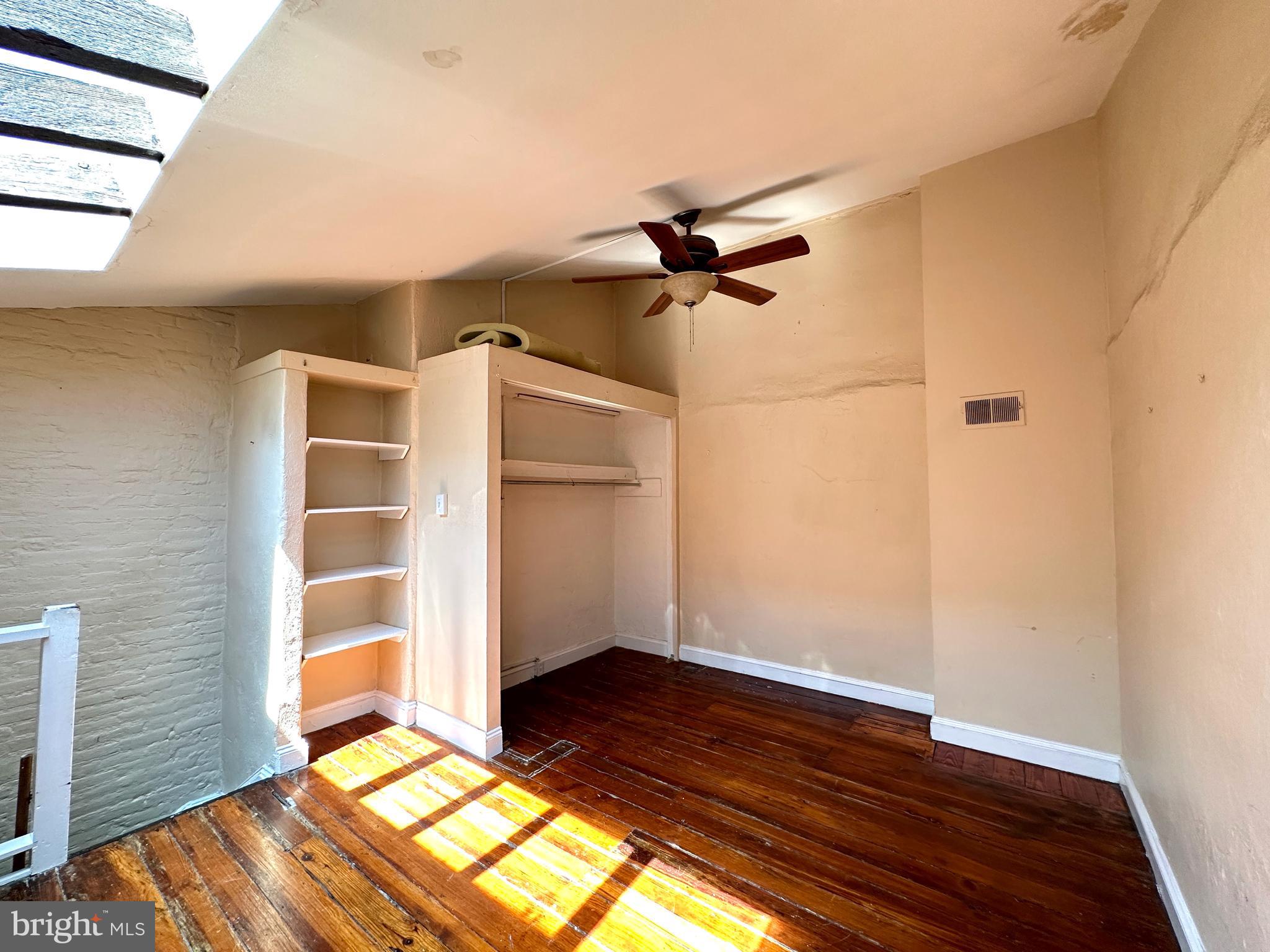 623 South American Street, Unit F Philadelphia, PA 19147 - Photo 25 of 38 a view of empty room with wooden floor and fan