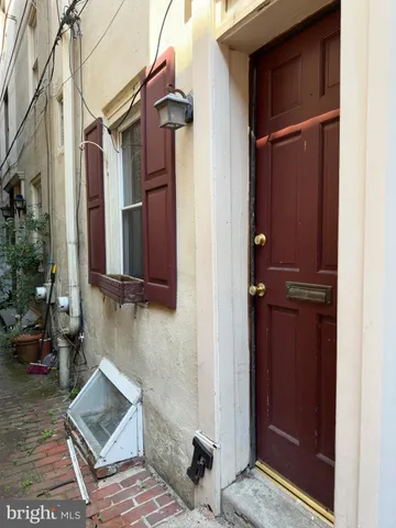 a backyard of a house with seating space