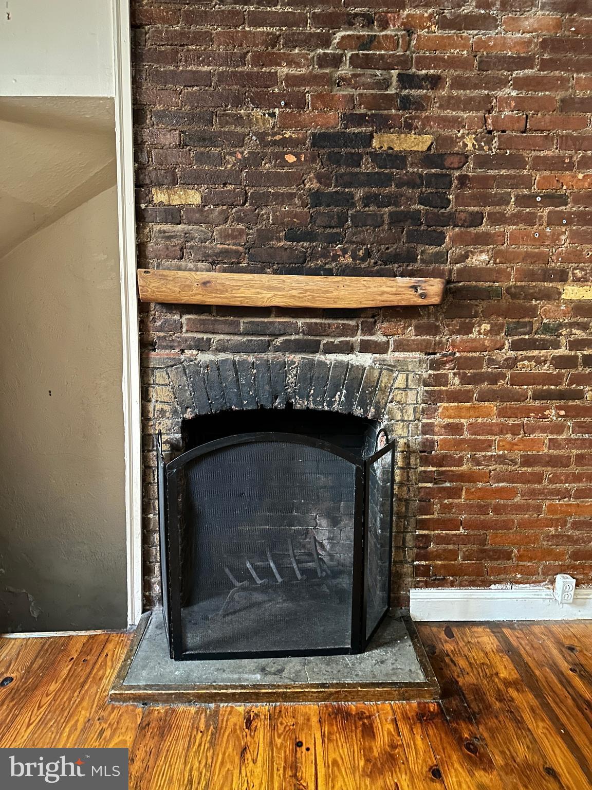 623 South American Street, Unit F Philadelphia, PA 19147 - Photo 6 of 38 a living room with a fireplace