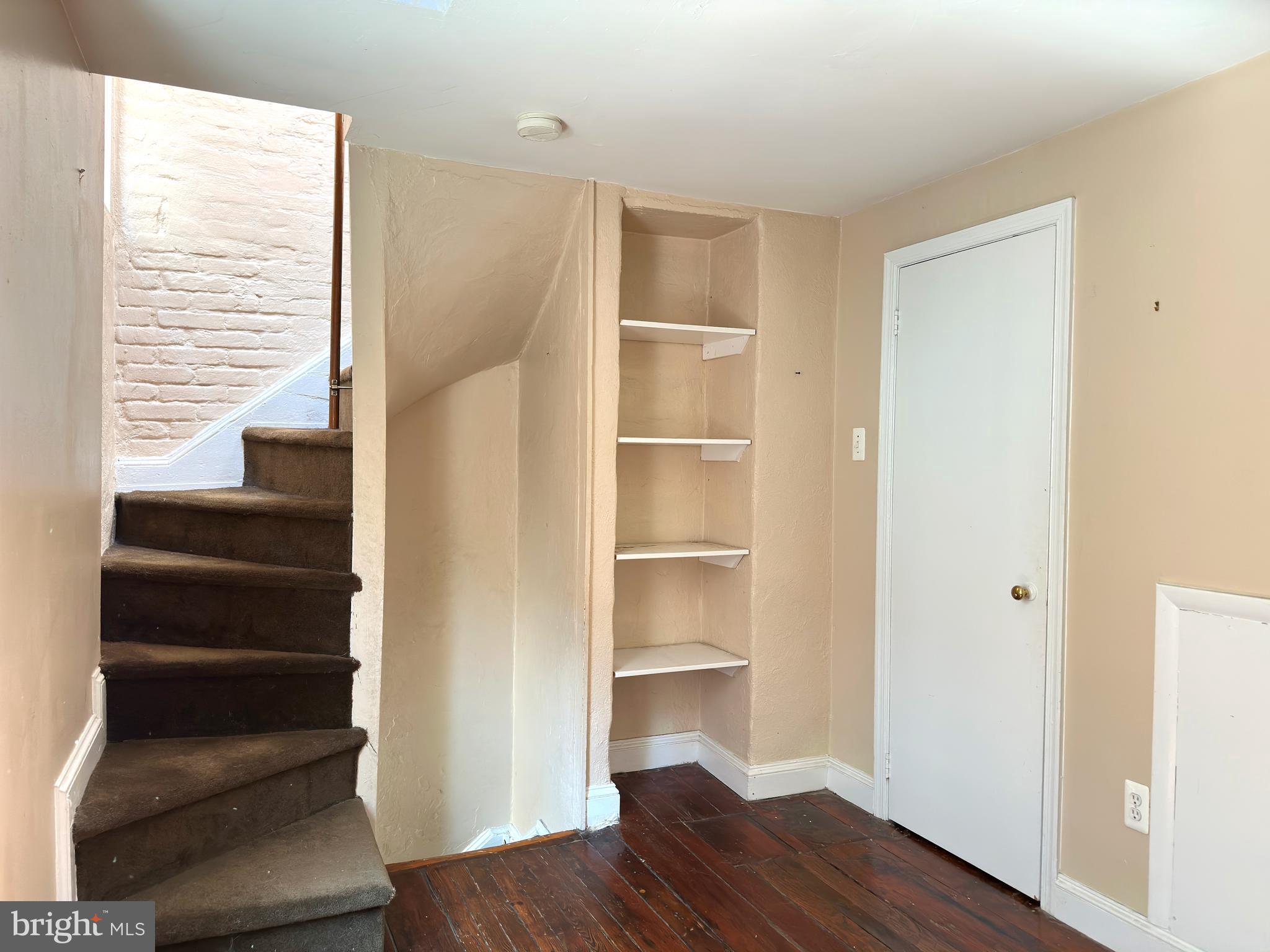 623 South American Street, Unit F Philadelphia, PA 19147 - Photo 10 of 38 a view of a room with wooden floor and windows